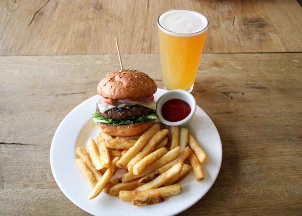 Eagle Landing Restaurant and Tavern | Burger and a Brew Thursday | Image of a burger with fries and a beer
